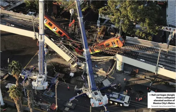  ?? Fernando Llano/Associated Press ?? Rail carriages dangle
from a collapsed elevated section of Mexico City’s Metro