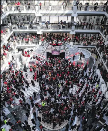  ?? HENRY TAYLOR / HENRY.TAYLOR@AJC.COM ?? A crowd starts to thin out at the end of a rally for the Falcons last month at Atlanta’s City Hall. The team’s success has drawn some area residents to become fans and encouraged others who abandoned the team to return.