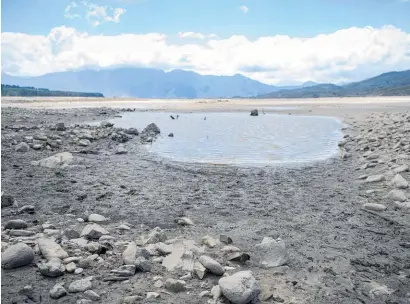  ?? Picture / AP ?? The Theewaters­kloof dam, Cape Town’s main water supply, is approachin­g a critically low level.