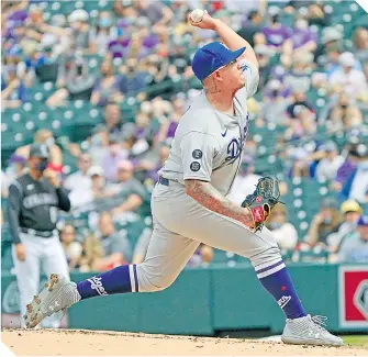  ?? / FOTO: REUTERS ?? Julio obtuvo la primera victoria en su carrera ante los Rockies.