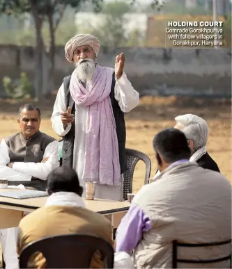  ?? SANDEEP SAHDEV ?? HOLDING COURT Comrade Gorakhpuri­ya with fellow villagers in Gorakhpur, Haryana