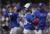  ?? SETH WENIG — THE ASSOCIATED PRESS ?? Blue Jays pitcher Génesis Cabrera, left, reacts as he is pulled from the game by manager John Schneider, right, during the seventh inning against the Yankees at Yankee Stadium on Friday in New York.