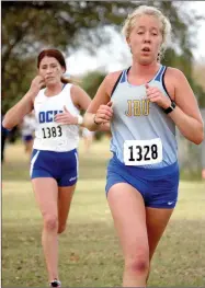  ?? Randy Roth/Special to the Herald-Leader ?? John Brown freshman Allika Pearson, right, of Siloam Springs, finished eighth overall at the Sooner Athletic Conference Meet on Saturday at Woodson Park in Oklahoma City. Pearson earned a spot in the NAIA National Meet on Nov. 16 in Cedar Rapids, Iowa.