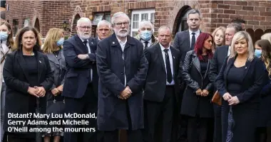  ??  ?? Distant? Mary Lou McDonald, Gerry Adams and Michelle O’Neill among the mourners