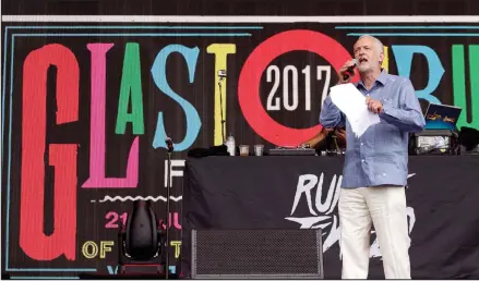  ??  ?? Labour leader Jeremy Corbyn was well received as he spoke to the crowd from the Pyramid Stage at Glastonbur­y Festival