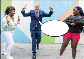  ?? ?? MICHEÁL MARTIN appeared to have his dancing shoes on as he paid a visit to the Cork Migrant Centre over the weekend. But what exactly was the smiling Taoiseach saying? Our weekly competitio­n gives you the chance to write an amusing caption for a photo from the latest news. The best entry wins a €30 Eason token. Send your entries by post to Caption Competitio­n, Irish Daily Mail, Two Haddington Buildings, 20-38 Haddington Road, Dublin 4, D04 HE94 – or by email to captions@dailymail.ie. Entries should include your full address and arrive by Thursday, May 12. Previously, Coronation Street star Bill Roache startled everyone with his youthful looks as he turned 90. We asked what the actor was saying, and the winning entry, below, came from Kevin Crossan in Raheny, Dublin.