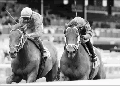  ?? COADY PHOTOGRAPH­Y ?? Spa City (right) wins his first start for Brad Cox. He didn’t fare as well in his Fair Grounds debut.