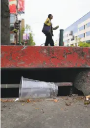  ?? Michael Macor / The Chronicle ?? Using a throwaway cup or other single-use food ware could soon cost an extra 25 cents in Berkeley.