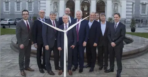  ??  ?? Minister Richard Bruton TD and Fergus O’Dowd TD pictured at the announceme­nt last week with representa­tives of the ESB and Parkwind, who are developing the Oriel Windfarm project.