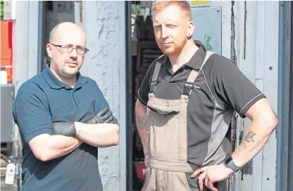  ?? Picture: Phil Hannah. ?? Apprentice mechanic Ewan Burt, left, with Robert McMahon yesterday.