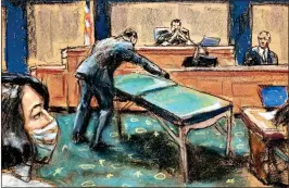  ?? ?? DRAMA: Jeffrey Epstein’s massage table is displayed in the New York court