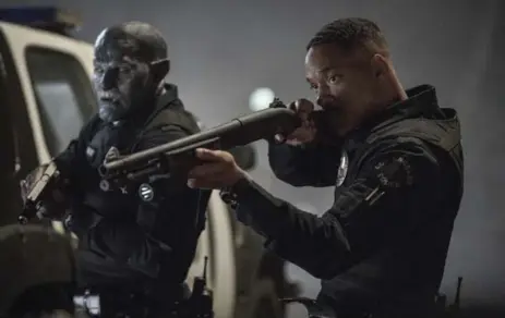  ?? MATT KENNEDY/THE ASSOCIATED PRESS ?? Will Smith, right, stars with Joel Edgerton in the fantasy buddy-cop tale Bright. It’s Netflix’s first try at a big-budget Hollywood production.