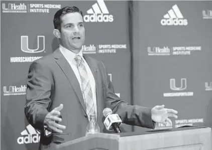  ?? WILFREDO LEE/AP ?? Manny Diaz speaks at a news conference Wednesday in Coral Gables after being introduced as Miami’s new head football coach.