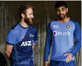  ?? ?? India’s Bhuvneshwa­r Kumar (right) with New Zealand skipper Kane Williamson.— ap