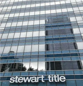  ?? Katherine Feser / Staff ?? BHP is offering its surplus space at Four Oaks Place for sublease. Stewart Title occupies 156,000 square feet on eight floors and has its name on the building.