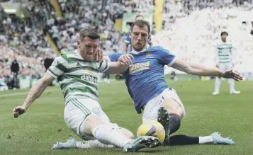  ?? ?? 0 Celtic defender Anthony Ralston is challenged by Borna Barisic in a hard-fought encounter