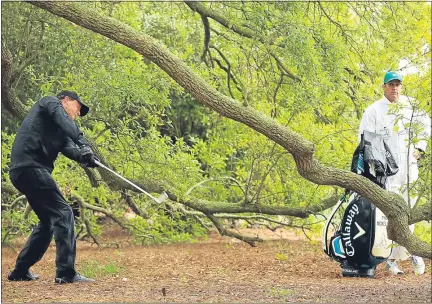  ??  ?? Phil Mickelson takes a freshair swipe at Augsta’s opening hole yesterday