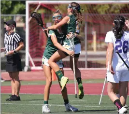  ?? PHOTOS BY TRACEY ROMAN ?? Mira Costa's Kate Donnelley,left, and Olivia Lorenzen celebrate as they score against Marlboroug­h in the Division 3 championsh­ip match on Saturday.