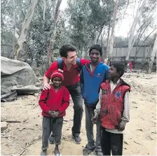  ?? DYLAN VERBURG ?? Dylan Verburg with, from left, Maya, Guddu and Kishan, orphaned siblings who he met while doing research in India. They had never gone to school, so he began to raise money to send them there.