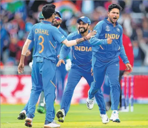  ?? REUTERS ?? ■ Kuldeep Yadav celebrates after bowling out Babar Azam of Pakistan at Old Trafford on Sunday. India won by 89 runs (DLS method).