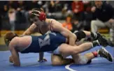  ?? Marc Billett/Tri-State Sports & News Service ?? North Hills senior Sam Hillegas (in red) has won three WPIAL Class 3A titles, two PIAA titles, and two Powerade Christmas Tournament titles.
in 2017, then moved up to 120 and won last year.
The top seed at 126 is Nic Bouzakis, who
