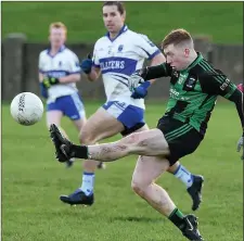  ??  ?? Dean Maguire makes a forward pass.