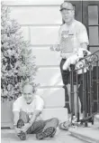  ?? FILE PHOTO BY DOUG MILLS, AP ?? Stephen Breyer and President Clinton cool down outside the White House after a morning jog May 16, 1994, three days after Clinton nominated Breyer for the Supreme Court.