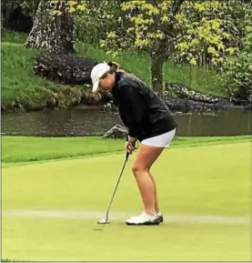  ?? SUBMITTED PHOTO - ONEIDA DAILY DISPATCH ?? Vernon-Verona-Sherrill senior Olivia Evans putts during the Section III girls golf tournament at Kanon Valley Country Club on Tuesday, May 22.