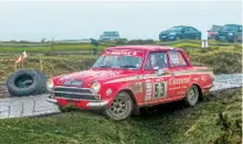  ??  ?? Mike Barratt’s Cortina takes time out on the way to second in Category 1.