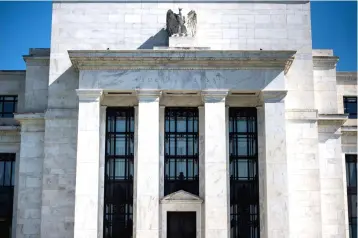  ??  ?? The US central bank was due to open a two-day policy meeting, that markets overwhelmi­ngly expect will produce the second interest rate hike of the year. — AFP photo