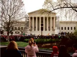  ?? MAANSI SRIVASTAVA/THE NEW YORK TIMES ?? Abortion rights groups rallied outside the Supreme Court building in Washington on Tuesday.