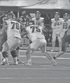  ?? BLAKE FOGLEMAN/SPECIAL to The Saline Courier ?? Benton senior linemen Justin Walker, 75, blocks in a game this past season. Walker earned 6A AllState honors.