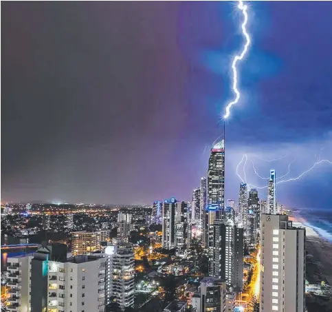  ??  ?? As the storm rolled in, Renee Doyle captured this amazing shot overlookin­g Surfers Paradise.