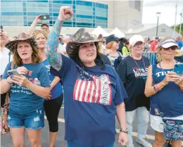  ?? MARY ALTAFFER/AP ?? Supporters of former President Donald Trump cheer as they wait in line Saturday outside a political rally in Wilkes-Barre.