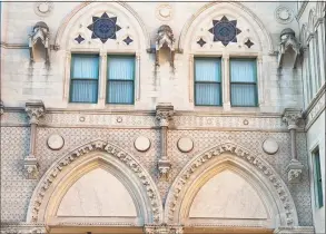  ?? ?? Three empty niches above the State Capitol’s east portico are evidence that architect Richard M. Upjohn expected more state heroes to be immortaliz­ed along the building’s third-floor facade.