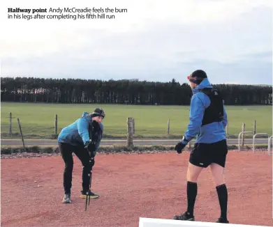  ??  ?? Halfway point Andy Mccreadie feels the burn in his legs after completing his fifth hill run