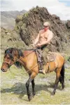  ?? ?? Russian President Vladimir Putin on horseback in 2009. Photo / AP