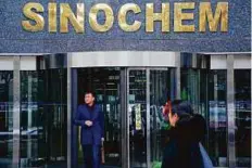  ?? Reuters ?? The Sinochem office in Beijing. The deal could see the conglomera­te walk away from a key overseas asset.