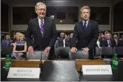  ?? ZACH GIBSON — THE ASSOCIATED PRESS ?? Senate Majority Leader Mitch McConnell, left, and Sen. Rand Paul on Capitol Hill. McConnell, R-Ky., sought to limit the pandemic relief bill that passed this month. Rand, R-Ky., voted against it.