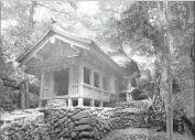  ?? Jiji Press ?? THE SHRINE on Okinoshima, part of a system of three Shinto shrines called the Munakata Taisha.