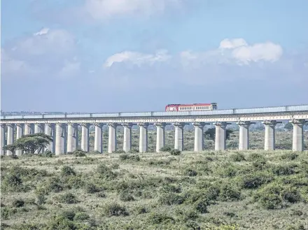  ?? NYT ?? The Standard Gauge Railway, funded and built by China, inside the Nairobi National Park in Kenya.