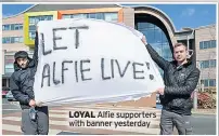  ??  ?? LOYAL Alfie supporters with banner yesterday