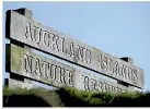  ??  ?? The Auckland Islands Nature Reserve sign on Enderby Island.