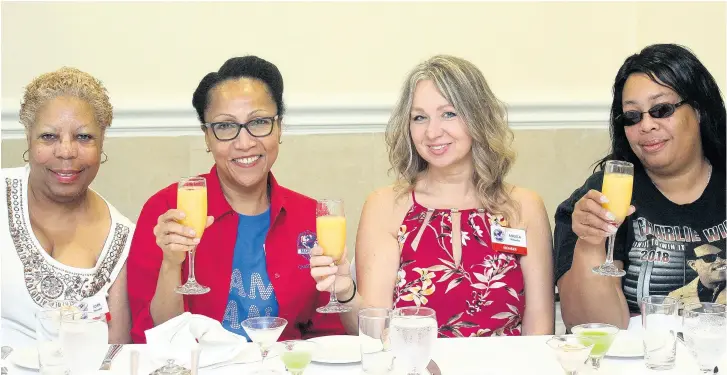  ??  ?? From left: Joan Bennett, Racine Gooding, Angela Wheeler and Elicia Slatten raised their glasses to a great morning at The Courtleigh Hotel and Suites.