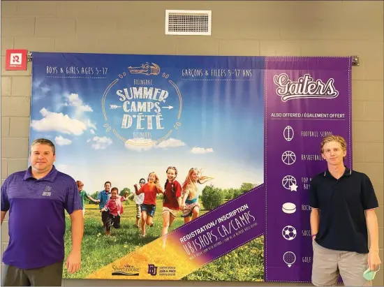  ?? PRISCILLA ALLATT ?? Christophe­r Fowlis and Simon Smith in front of the Summer Day Camp poster at Bishop’s University.