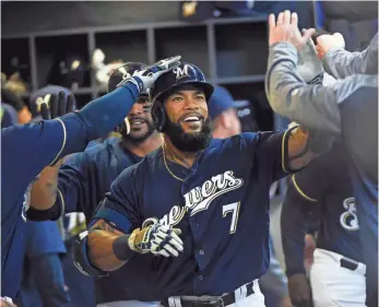  ?? BENNY SIEU, USA TODAY SPORTS ?? Eric Thames celebrates after his two-run shot April 25, one of his 12 home runs this season.