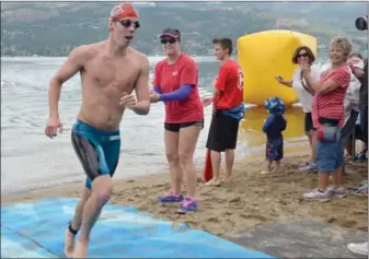  ?? Daily Courier file photo ?? In 2016, Coquitlam resident Tim James Woinoski was the winner of the 2.1kilometre Across the Lake Swim in a time of 23 minutes and 29 seconds.