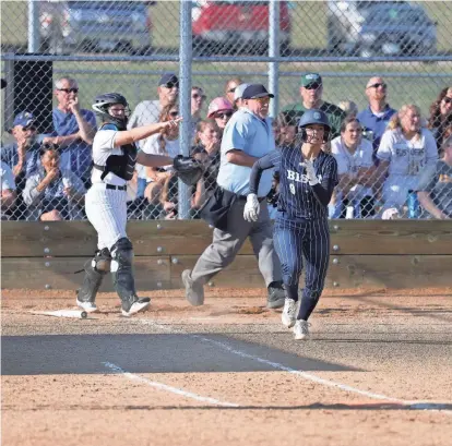  ?? PROVIDED BY SUSAN AMO/GREAT FALLS HIGH SCHOOL ?? Great Falls High’s Morgan Davis runs to first base following a hit against CMR during Tuesday’s crosstown softball game at the Multi-Sports Complex.
