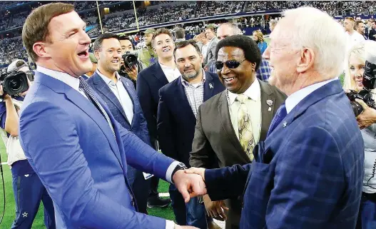  ?? RON JENKINS/THE ASSOCIATED PRESS ?? Dallas Cowboys owner Jerry Jones, right, should be taking the heat for the team’s struggles, says retired quarterbac­k Troy Aikman, not pictured.