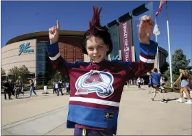  ?? AP PHOTO/DAVID ZALUBOWSKI ?? Ten-year-old Greyson Goldstein stands outside Ball Arena before Game 1of the NHL hockey Stanley Cup Final between the Tampa Bay Lightning and the Colorado Avalanche Wednesday, June 15, 2022, in Denver.